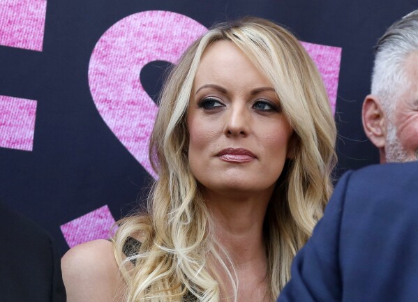 FILE - Stormy Daniels appears at an event, May 23, 2018, in West Hollywood, Calif. The hush money trial of former President Donald Trump begins Monday, April 15, 2024, with jury selection. It's the first criminal trial of a former U.S. commander-in-chief. The charges in the trial center on $130,000 in payments that Trump's company made to his then-lawyer, Michael Cohen. He paid that sum on Trump's behalf to keep Daniels from going public, a month before the election, with her claims of a sexual encounter with Trump a decade earlier. (AP Photo/Ringo H.W. Chiu, File)
