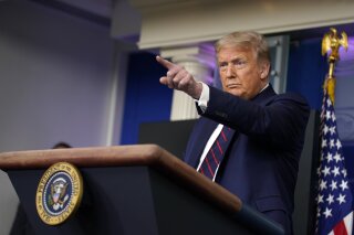 President Donald Trump calls on members of the press during a news conference at the White House, Tuesday, July 21, 2020, in Washington. (AP Photo/Evan Vucci)