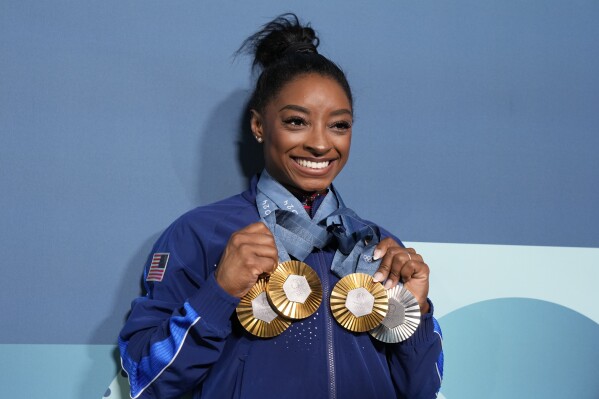 Women's floor final: Simone Biles finishes Olympics with silver | AP News