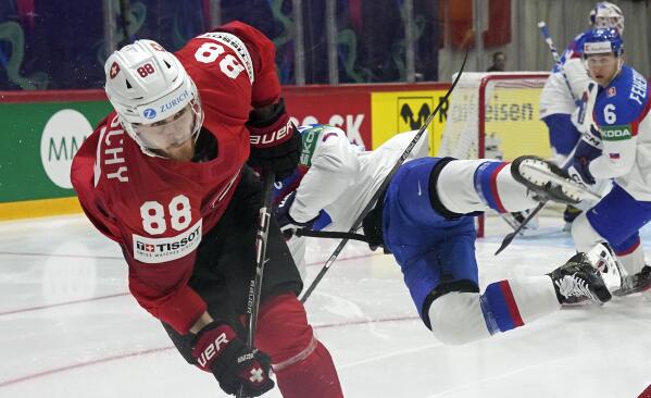 Sweden beats Finland, Swiss edge Slovakia hockey worlds AP