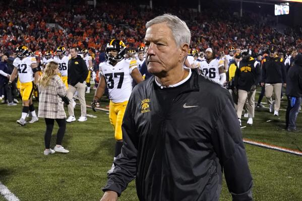 Iowa head coach Kirk Ferentz walks off the field after his team's 9-6 loss to Illinois in an NCAA college football game Saturday, Oct. 8, 2022, in Champaign, Ill. (AP Photo/Charles Rex Arbogast)