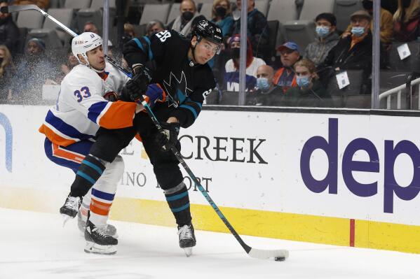 New York Islanders defenseman Zdeno Chara (33) defends against against San Jose Sharks right wing Timo Meier (28) during the first period of an NHL hockey game in San Jose, Calif., Thursday, Feb. 24, 2022. (AP Photo/Josie Lepe)