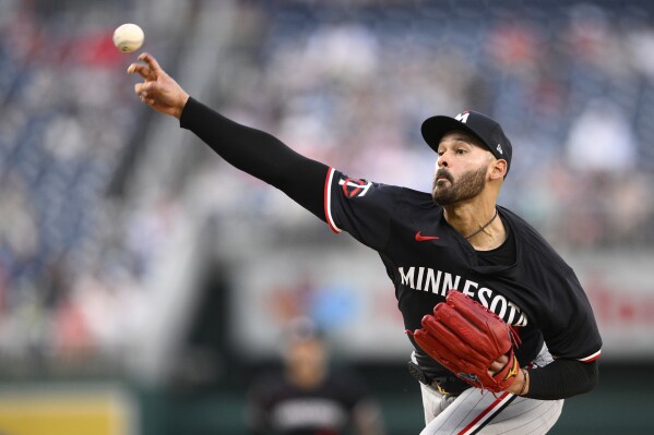 Minnesota Twins starting pitcher Pablo Lopez throws during the fourth inning of a baseball game against the Washington Nationals, Monday, May 20, 2024, in Washington. (AP Photo/Nick Wass)