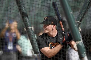 FILE - In this June 25, 2019, file photo, Baltimore Orioles first-round draft pick Adley Rutschman takes batting practice before a baseball game against the San Diego Padres in Baltimore. The Orioles called Rutschman up to the majors Saturday, May 21, 2022, paving the way for the 24-year-old catcher to make his big league debut.  (AP Photo/Nick Wass, File)