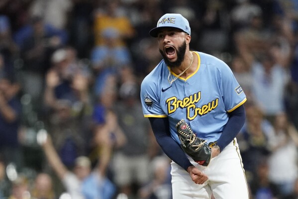 Yankees acquire All-Star closer Devin Williams from Brewers | AP News