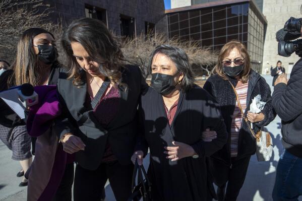 Relatives of victims of the August 2019 Walmart mass shooting, who declined to speak to the media, leave the federal court in El Paso, Texas, Wednesday, Feb. 8, 2023. Defendant Patrick Crusius pleaded guilty to federal charges accusing him of killing 23 people in the racist attack, changing his plea weeks after the U.S. government said it wouldn't seek the death penalty for the hate crimes and firearms violations. (AP Photo/Andrés Leighton)