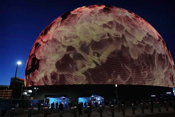 Members of the media wait for celebrities to arrive during the opening night of the Sphere, Friday, Sept. 29, 2023, in Las Vegas. (AP Photo/John Locher)