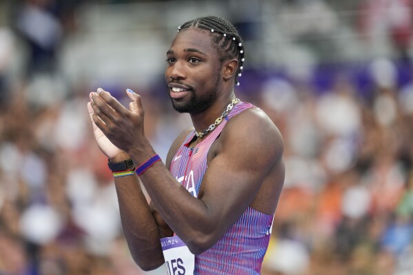 Noah Lyles, of the United States, competes during the men's 200-meter semifinal at the 2024 Summer Olympics, Wednesday, Aug. 7, 2024, in Saint-Denis, France. (AP Photo/Bernat Armangue, File)