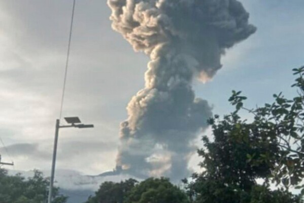 An explosive eruption occurs at the summit vent of Mount Kanlaon, as seen from Bago City, Negros Occidental province, Philippines on Tuesday April 8, 2025. (AP Photo/Chona Aplaon)