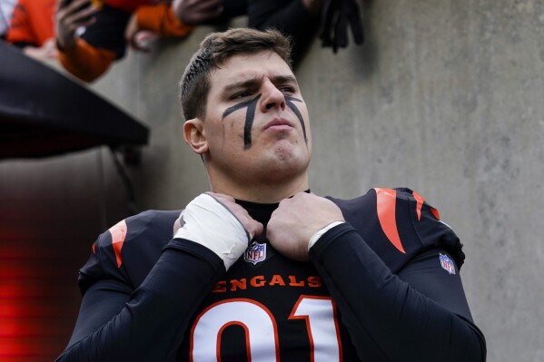 FILE - Cincinnati Bengals defensive end Trey Hendrickson looks on during an NFL football game against the Baltimore Ravens, Sunday, Jan. 8, 2023, in Cincinnati. Two-time Pro Bowl defensive end Trey Hendrickson signed a one-year contract extension Thursday that ties him to Cincinnati through the 2025 season. Terms of the deal were not disclosed. (AP Photo/Jeff Dean, File)