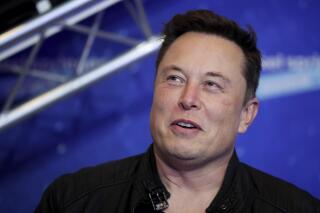 FILE - Tesla and SpaceX CEO Elon Musk arrives on the red carpet for the Axel Springer media award in Berlin on Dec. 1, 2020. A federal judge in California has dismissed a securities fraud and defamation lawsuit on Thursday, May 19, 2022, that a Tesla investor had filed against CEO Elon Musk, the company and a supporter of Musk.
(Hannibal Hanschke/Pool Photo via AP, File)