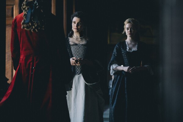 
              This image released by Fox Searchlight Films shows Rachel Weisz and Emma Stone, right, in a scene from the film "The Favourite." (Atsushi Nishijima/Fox Searchlight Films via AP)
            