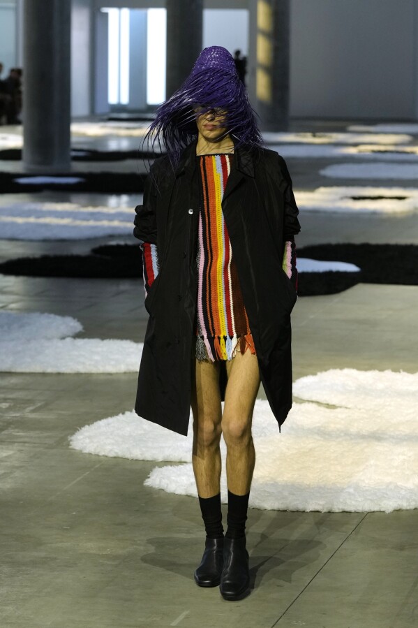 A model wears a creation as part of the men's Prada Spring-Summer 2026 collection, that was presented in Milan, Italy, Sunday, June 22, 2025. (AP Photo/Luca Bruno)