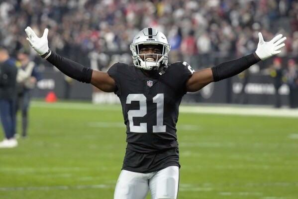 FILE - Las Vegas Raiders cornerback Amik Robertson (21) leaves the field after an NFL football game against the New England Patriots, Sunday, Dec. 18, 2022, in Las Vegas. The Detroit Lions and cornerback Amik Robertson agreed to a $9.25 million, two-year contract with $1.5 million in incentives, according to a person familiar with the situation. The person spoke to The Associated Press on condition of anonymity because the deal had not been announced Tuesday, March 12, 2024, a day before the new league year begins.(AP Photo/Rick Scuteri, File)