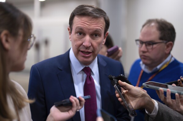 Sen. Chris Murphy, D-Conn., the Democrats' chief negotiator on the border security talks, speaks with reporters at the Capitol in Washington, Thursday, Jan. 25, 2024. Any bipartisan border deal could be doomed because of resistance from former President Donald Trump. (AP Photo/J. Scott Applewhite)