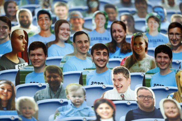 Cardboard fans fill a portion of the seats in Kenan Stadium prior to the Tar Heels' game against Syracuse on Saturday, Sept. 12, 2020, in Chapel Hill, N.C. Fans have been prohibited from attending the game due to the COVID-19 pandemic. (Robert Willett/The News & Observer via AP, Pool)