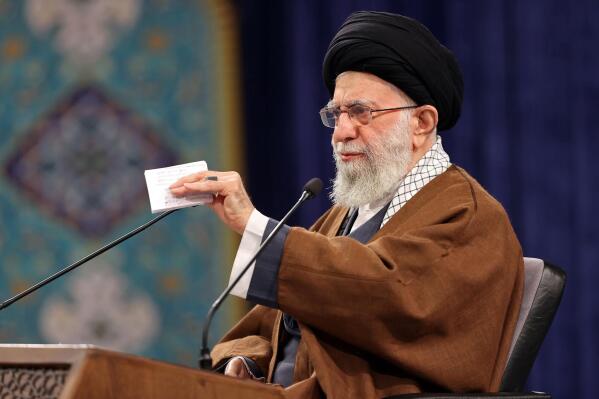 In this photo released by the official website of the office of the Iranian supreme leader, Supreme Leader Ayatollah Ali Khamenei speaks during a televised video conference with an audience in the city of Tabriz commemorating the 1979 Islamic Revolution, in Tehran, Iran, Thursday, Feb. 17, 2022. Khamenei vowed that his country would ramp up development of its civilian nuclear energy program, as major world powers continued delicate talks in Vienna to revive Tehran’s landmark nuclear deal. Khamenei asserted that it had no interest in nuclear weapons. (Office of the Iranian Supreme Leader via AP)