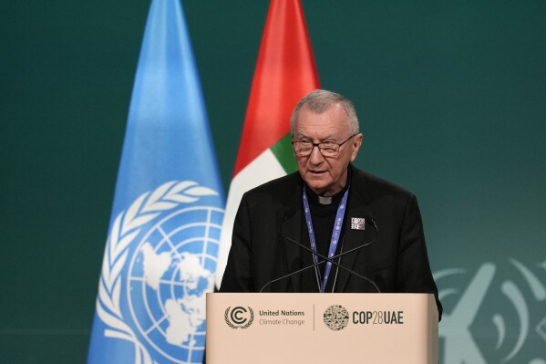FILE - Vatican secretary of state, Cardinal Pietro Parolin, speaks during a plenary session at the COP28 U.N. Climate Summit, Saturday, Dec. 2, 2023, in Dubai, United Arab Emirates. Israel has formally complained after the Vatican No. 2 spoke of the 鈥渃arnage鈥� in Gaza and what he termed a disproportionate Israeli military operation following the Oct. 7 Hamas attacks. (APPhoto/Rafiq Maqbool, File)