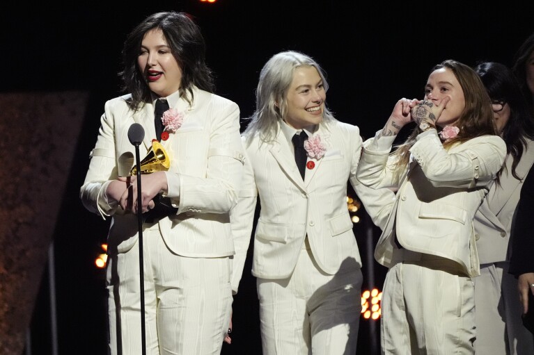 Lucy Dacus, from left, Phoebe Bridgers, Julien Baker, of boygenius accept the award for best rock performance 