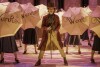 This image released by Warner Bros. Pictures shows Timothee Chalamet, center, in a scene from "Wonka." (Jaap Buittendijk/Warner Bros. Pictures via AP)