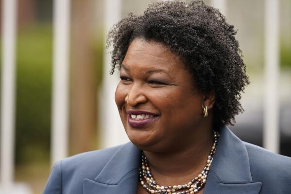FILE - Georgia Democratic gubernatorial candidate Stacey Abrams talks to the media during Georgia's primary election on Tuesday, May 24, 2022, in Atlanta. Abrams announced housing proposals on Wednesday, July 27, 2022 that she says will improve affordability, reduce homelessness, and make it easier for longtime residents to remain in gentrifying neighborhoods.  (AP Photo/Brynn Anderson, File)