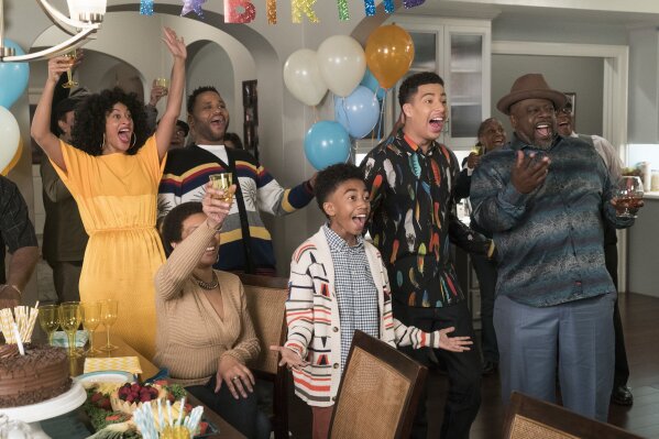 
              This image released by ABC shows, standing from left, Tracee Ellis Ross, Anthony Anderson, Miles Brown, Marcus Scribner and Cedric the Entertainer in a scene from "black-ish." The program was nominated for an Emmy on Thursday for outstanding comedy series. The 70th Emmy Awards will be held on Monday, Sept. 17. (Ron Tom/ABC via AP)
            