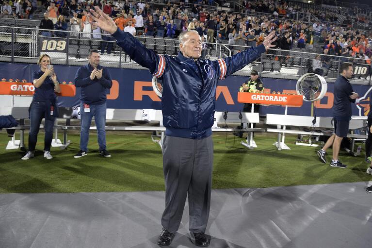 FILE - Apollo 7 astronaut Walter Cunningham acknowledges the crowd before an Alliance of American Football game between the Orlando Apollos and the Atlanta Legend, Feb. 9, 2019, in Orlando, Fla. Cunningham, the last surviving astronaut from the first successful crewed space mission in NASA's Apollo program, has died. He was 90. (AP Photo/Phelan M. Ebenhack, File)