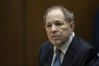 FILE - Former film producer Harvey Weinstein appears in court at the Clara Shortridge Foltz Criminal Justice Center in Los Angeles, Calif., on Oct. 4 2022. A Los Angeles judge is scheduled to sentence the former movie mogul on Thursday, Feb. 23, 2023, to up to 18 years in prison after he was convicted in December of raping and sexually assaulting an Italian model and actor during a 2013 film festival. (Etienne Laurent/Pool Photo via AP, File)