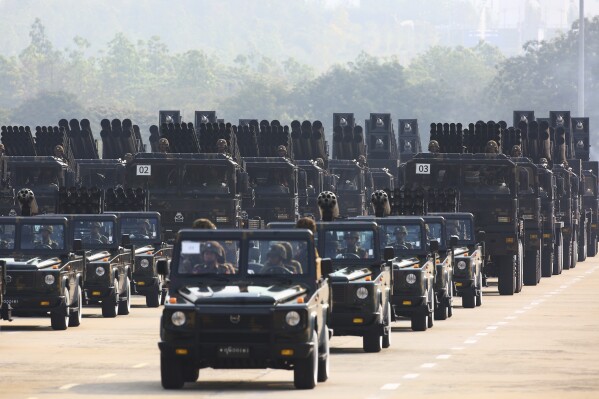 Myanmar military officers leave the venue during a parade to commemorate Myanmar's 78th Armed Forces Day in Naypyitaw, Myanmar, on March 27, 2023. (AP Photo/Aung Shine Oo)