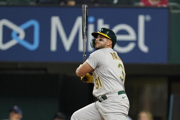 Pinder's 12th-inning slam lifts A's over Rangers 14-7