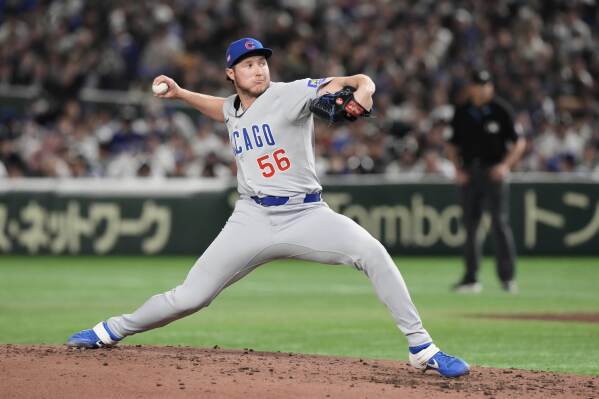 Chicago Cubs relief pitcher Nate Pearson throws to the Los Angeles Dodgers in the fifth inning of an MLB Tokyo Series baseball game in Tokyo, March 19, 2025. (AP Photo/Eugene Hoshiko, File)