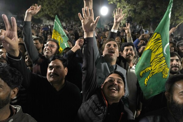 Supporters of Former Prime Minister Nawaz Sharif' party 'Pakistan Muslim League-N' celebrate their party victory in the initial results of the country's parliamentary election, in Lahore, Pakistan, Friday, Feb. 9, 2024. (APPhoto/K.M. Chaudary)