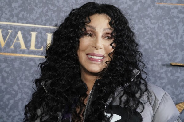 FILE - Cher arrives at the premiere of "Chevalier" in Los Angeles on rApril 16, 2023. Cher's holiday album, “Christmas,” releases Friday. (Photo by Jordan Strauss/Invision/AP, Filer)