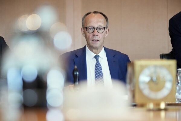 CORRECTS BYLINE - German Chancellor Friedrich Merz attends a cabinet meeting at the chancellery in Berlin, Germany, Wednesday, May 21, 2025. (AP Photo/Ebrahim Noroozi)