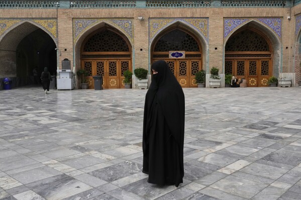 A woman prays at the courtyard of Imam mosque at Tehran's old main bazaar, Iran, Monday, May 5, 2025. (AP Photo/Vahid Salemi)