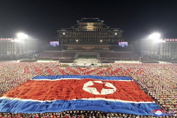 FILE - In this photo provided by the North Korean government, a huge North Korean flag is displayed during a celebration of the nation's 73rd anniversary at Kim Il Sung Square in Pyongyang, North Korea on Sept. 9, 2021. The content of this image is as provided and cannot be independently verified. Korean language watermark on image as provided by source reads: "KCNA" which is the abbreviation for Korean Central News Agency. (Korean Central News Agency/Korea News Service via AP, File)