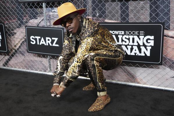 FILE - DaBaby attends the world premiere of "Power Book III: Raising Kanan" at the Hammerstein Ballroom on Thursday, July 15, 2021, in New York. DaBaby was cut Sunday, Aug. 1, 2021 from Lollapalooza's closing lineup following crude and homophobic remarks he made last week at a Miami-area music festival. (Photo by Charles Sykes/Invision/AP)