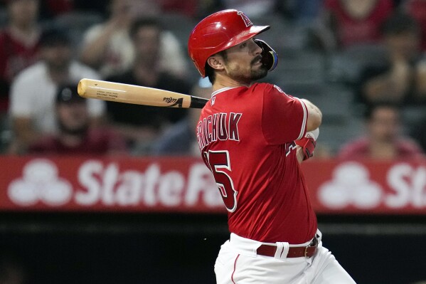 FILE - Los Angeles Angels' Randal Grichuk drives in the winning run with an RBI single against the Cleveland Guardians in a baseball game in Anaheim, Calif., Thursday, Sept. 7, 2023. The Arizona Diamondbacks and veteran slugger Randal Grichuk agreed Saturday, Feb. 17, 2024, on a $2 million, one-year contract with a mutual option for 2025, a person with direct knowledge of the deal told The Associated Press. (AP Photo/Ashley Landis, File)