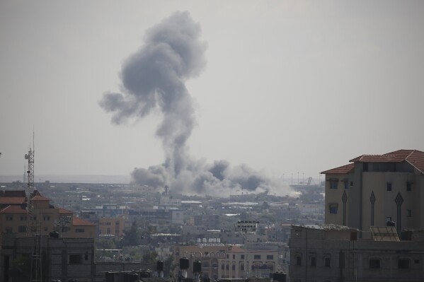 Smoke rises following an Israeli airstrike in Rafah, southern Gaza Strip, Tuesday, Oct. 17, 2023. (AP Photo/Hatem Ali)