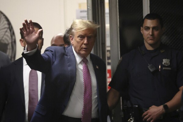 Former President Donald Trump arrives at Manhattan criminal court in New York, Friday, April 19, 2024.( Spencer Platt/Pool Photo via AP)