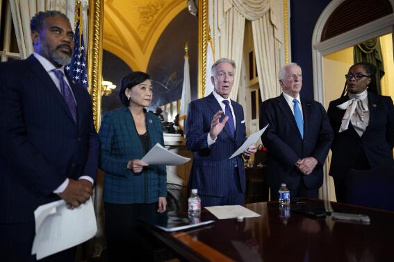 House Ways and Means Committee Chairman Richard Neal, D-Mass., talks to the media after the House Ways & Means Committee voted on whether to publicly release years of former President Donald Trump's tax returns during a hearing on Capitol Hill in Washington, Tuesday, Dec. 20, 2022. From left are Rep. Steven Horsford, D-NV., Rep. Judy Chu, D-Calif., Neal, Rep. Mike Thompson, D-Calif., and Del. Stacey Plaskett, D-Virgin Islands. (AP Photo/J. Scott Applewhite)