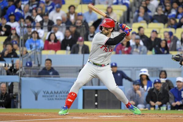 Philadelphia Phillies' Bryce Harper bats during the first inning of a baseball game against the Los Angeles Dodgers Tuesday, May 2, 2023, in Los Angeles. (AP Photo/Mark J. Terrill)