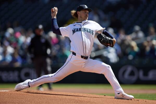Seattle Mariners pitcher Bryce Miller throws to a Cincinnati Reds batter during the first inning of a baseball game, Wednesday, April 17, 2024, in Seattle. (AP Photo/John Froschauer)