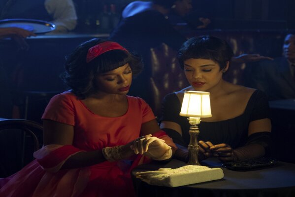 Aja Naomi King, left, and Tessa Thompson appear in a scene from "Sylvie's Love." (Amazon Studios via AP)