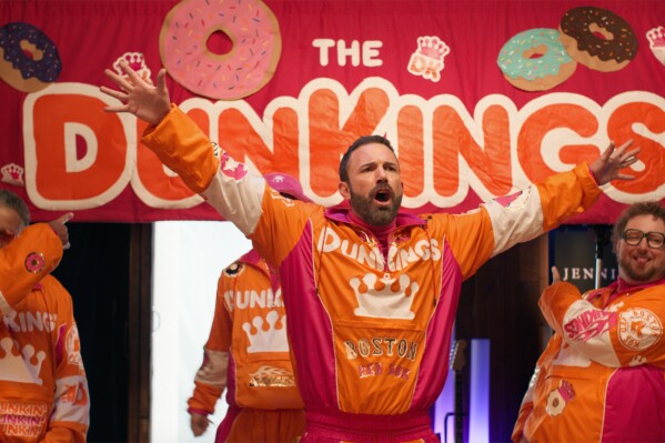 This photo provided by Dunkin' shows Ben Affleck in a still from the company's 2024 Super Bowl NFL football game ad campaign. (Brigette Buckner/Dunkin' via AP)