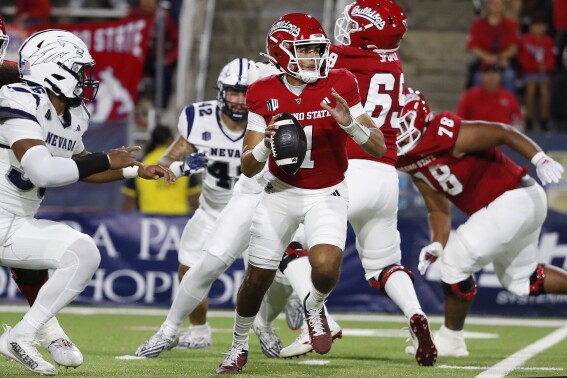 Fresno State quarterback Mikey Keene looks for room to run against during the first half of the team's NCAA college football game against Nevada in Fresno, Calif., Saturday, Sept. 30, 2023. (AP Photo/Gary Kazanjian)