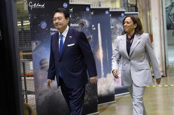Vice President Kamala Harris, right, walks with South Korea's President Yoon Suk Yeol, left, during a visit to NASA's Goddard Space Flight Center in Greenbelt, Md., Tuesday, April 25, 2023. (AP Photo/Susan Walsh)