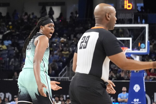 New York Liberty's Jonquel Jones reacts toward a referee after being called for a foul during the first half of a WNBA basketball game against the Chicago Sky Tuesday, June 4, 2024, in Chicago. (AP Photo/Charles Rex Arbogast)