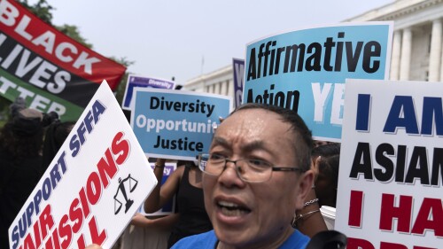 Demonstrators protest outside of the Supreme Court in Washington, Thursday, June 29, 2023, after the Supreme Court struck down affirmative action in college admissions, saying race cannot be a factor. (AP Photo/Jose Luis Magana)
