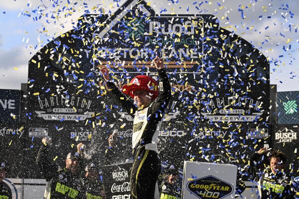 William Byron celebrates in Victory Lane after winning a NASCAR Cup Series auto race at Darlington Raceway, Sunday, May 14, 2023, in Darlington, S.C. (AP Photo/Matt Kelley)